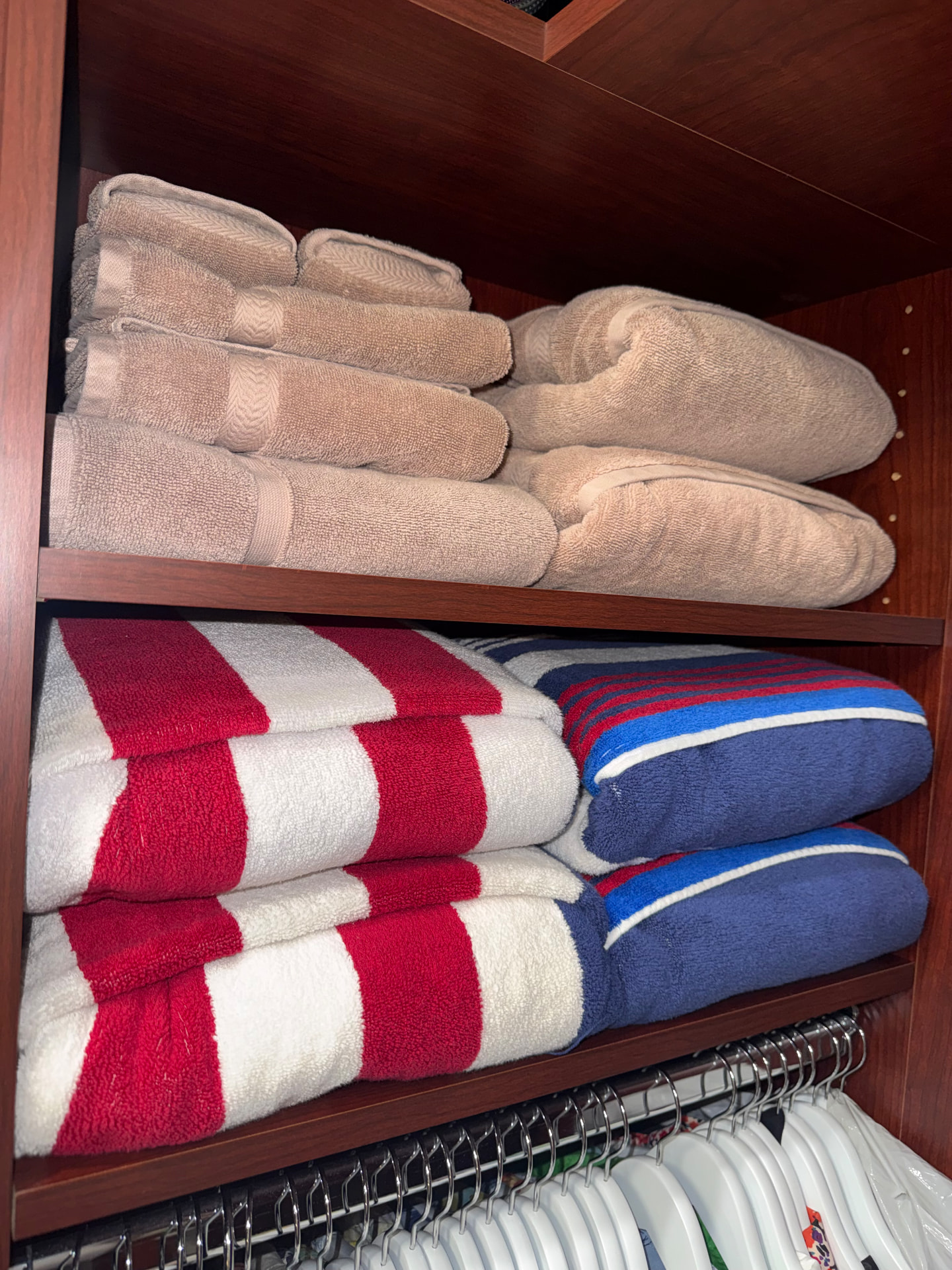 Seasonal linens, upper shelving
